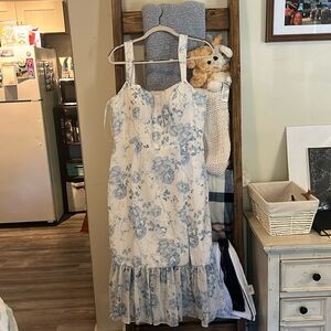 White dress with blue florals, brand new and hand tailored to a size 14.